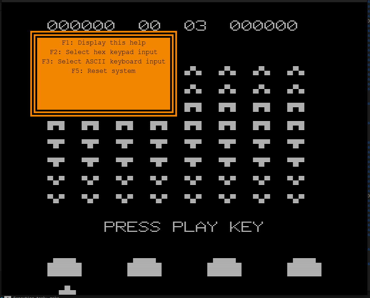 Microtan 65 emulator showing International Space Invaders with a help panel and alien graphics